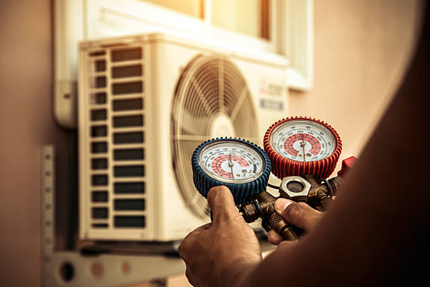 Professional Air Conditioning Service technician working in Warrenton, NC